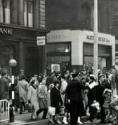 A busy Fargate crossing in 1965, showing the Austin Reed menswear shop and Richard's ladies fashion shop on the corner of Chapel Walk