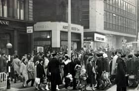 A busy Fargate crossing in 1965, showing the Austin Reed menswear shop and Richard's ladies fashion shop on the corner of Chapel Walk