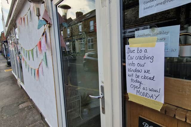 The sign placed in the window of the boarded up cafe. Photo: National World