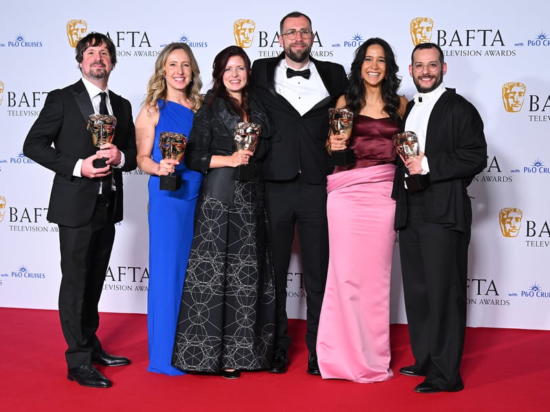 Simon McMahon, Sarah Waldron, Sasha Joelle Achilli, Joshua Baker and Sara Obeidat pose with the Current Affairs Award for 'The Shamima Begum Story (This World)' in the Winners Room during the 2024 BAFTA Television Awards. 