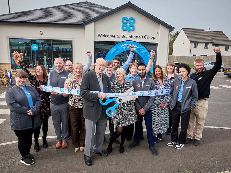 Jack Foster, from Bramhope Methodist Church, was on hand to cut the ribbon alongside store manger Jodie Walker and the full team.