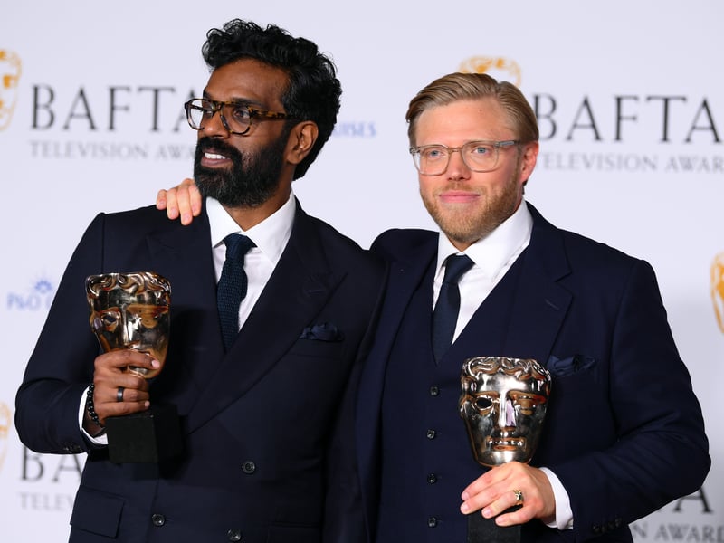 Romesh Ranganathan and Rob Beckett pose with the Entertainment Performance Award for 'Rob & Romesh Vs' in the Winners Room during the 2024 BAFTA Television Awards.