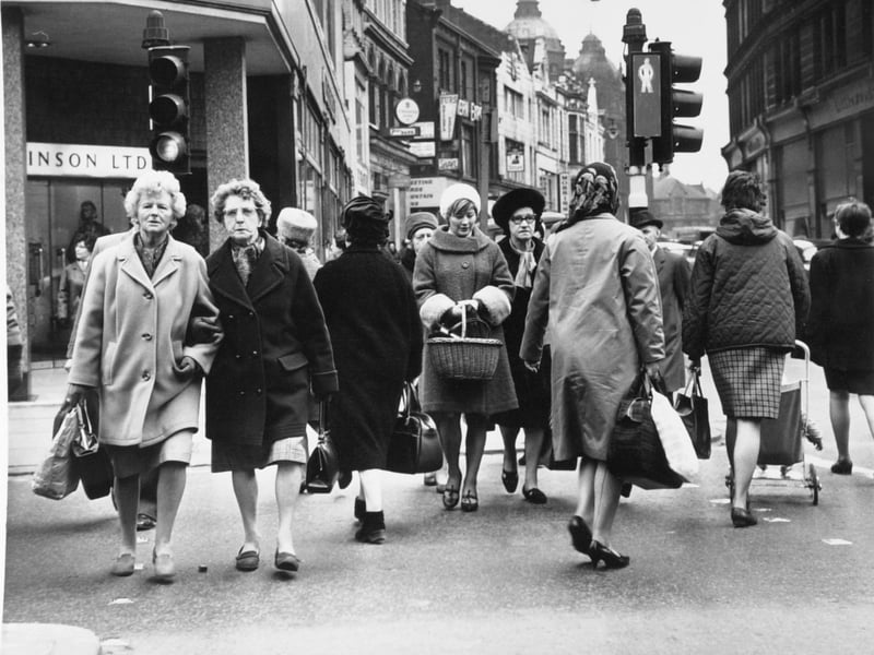 Shoppers make their way along Briggate in October 1967.