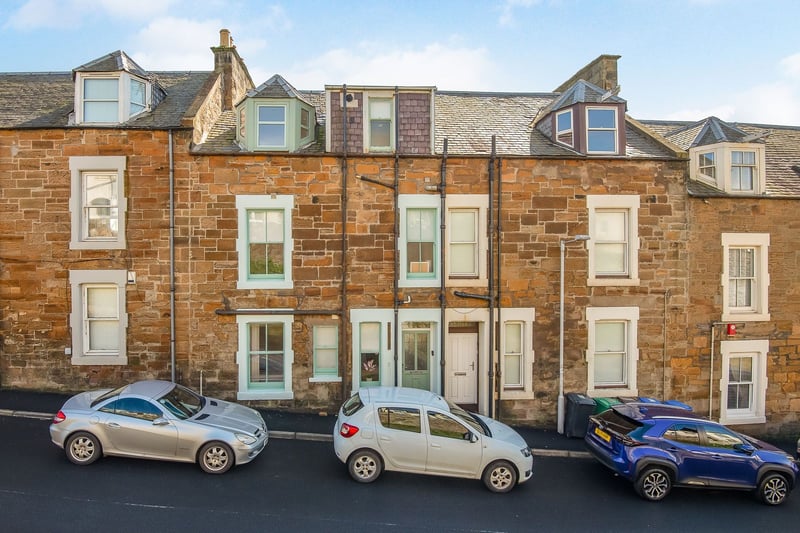 Located on the East Neuk of Fife, picturesque Pittenweem is a highly sought-after location, and properties like this at 59 Abbey Wall Road, don’t come up often – so it’s easy to see why so many have been intrigued, pushing this property into second place! This traditional, four-bedroom terraced
townhouse is situated directly beside the coast, with the most spectacular, uninterrupted sea views. The property has been arranged as a self-contained one-bedroom annex apartment on the ground floor, with the upper two storeys forming its own three-bedroom house, offering a charming coastal lifestyle and an investment opportunity. This home is currently available at offers over £425,000.