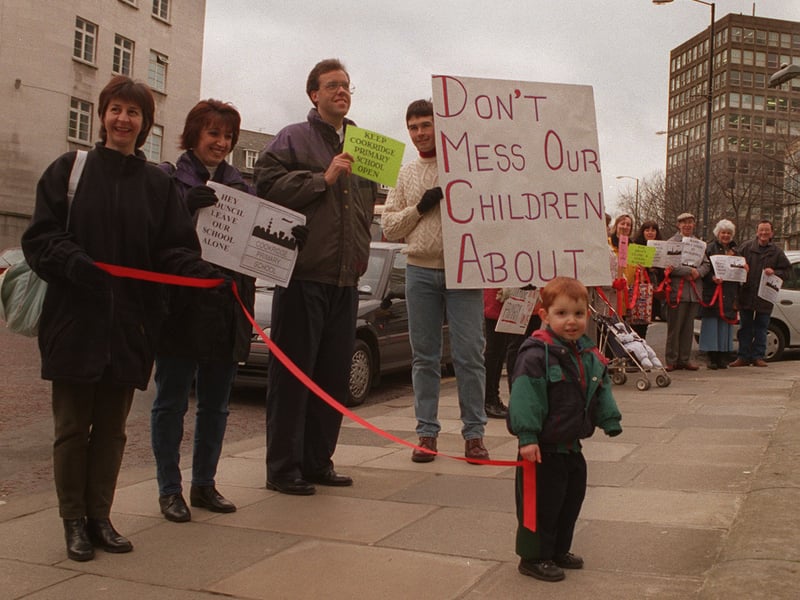 Young Matthew Barnes joins members of the Cookridge Primary School protest outside the Civic Hall.