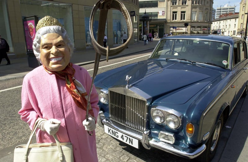 The 'Queen' with a dog collar, pictured outside Sheffield Yown Hall, appealing for a dog for the Sheffield Mayfest, on May 16, 2002