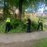 Police conducting a weapon search in the Headford Gardens area of Sheffield city centre, where a knife was found concealed in some bushes