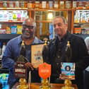 Bath Hotel landlord Brian Johnson, left, receiving the pub of the year award from Paul Crofts, Sheffield CAMRA treasurer and organiser of Sheffield Beer Festival. 