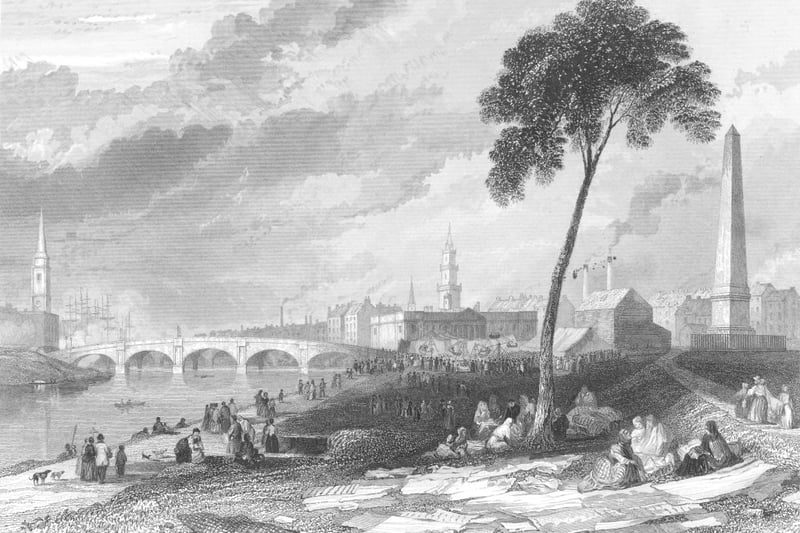 Circa 1860:  Women drying their linen near a fairground beside the Hutcheson Bridge over the River Clyde, a masonry arch bridge, designed by Robert Stevenson, grandfather to the author Robert Louis Stevenson. It was demolished in 1868 and replaced by the Albert Bridge, that still stands today. 

An engraving by T A Prior after a sketch by T H Haine from a painting by W Hervey. 