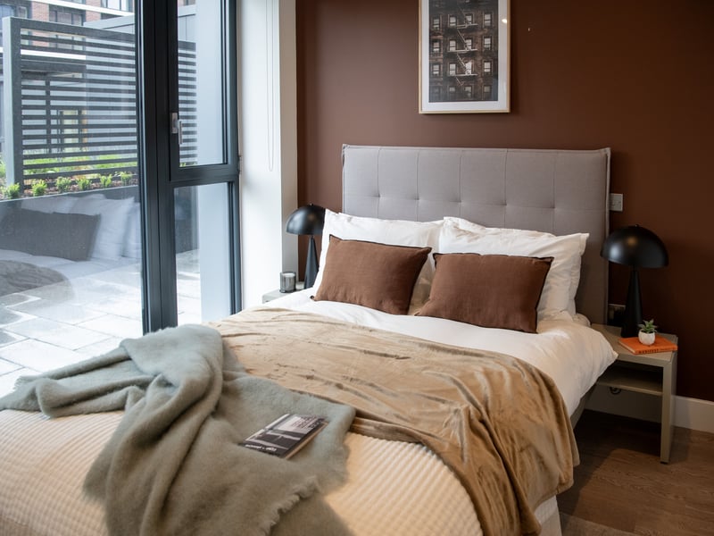 Amenities available to residents include a cinema room and multiple co-working community spaces