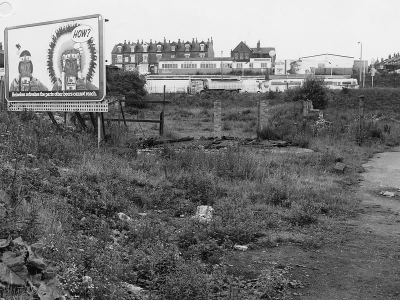 Wasteland off East Street, with advertising hoarding for Heineken beer on the left. D.M. Keith Ltd, car dealers, is in the background. Pictured in October 1978.