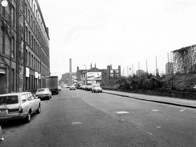 Looking along East Street with five-storey building on the left and an area of wasteland fenced off on the right. Pictured in October 1978.