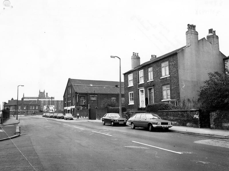Cross Green Lane looking north west, with Nos. 37-39 in the foreground. Further along the road is a factory and in the background on the left the Fisherman's Hut public house. Pictured in October 1978.
