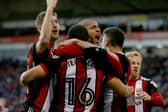 Leon Clarke (C) of Sheffield United celebrates scoring with teamates during the Sky Bet Championship match between Sheffield United and Hull City at Bramall Lane on November 4, 2017 in Sheffield, England. (Photo by Nigel Roddis/Getty Images)