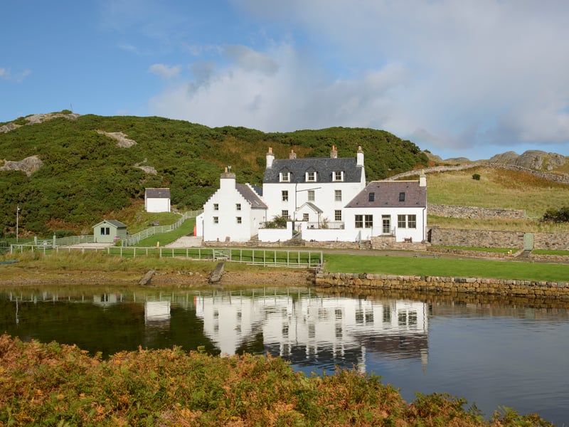 This property is an outstanding, B-listed, historic coastal property with sheltered harbour, moorland and private island.