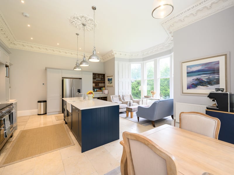 The open-plan kitchen dining room is light and airy.