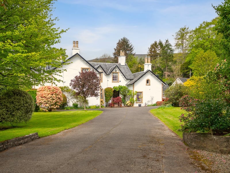 This seven-bedroom home is set within an acre of grounds