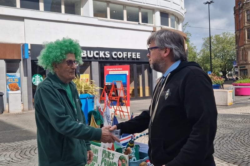 This man, who says he used to sort John's glasses while working at Specsavers, walked up to give John a hug and a chocolate bar from Hotel Chocolat.