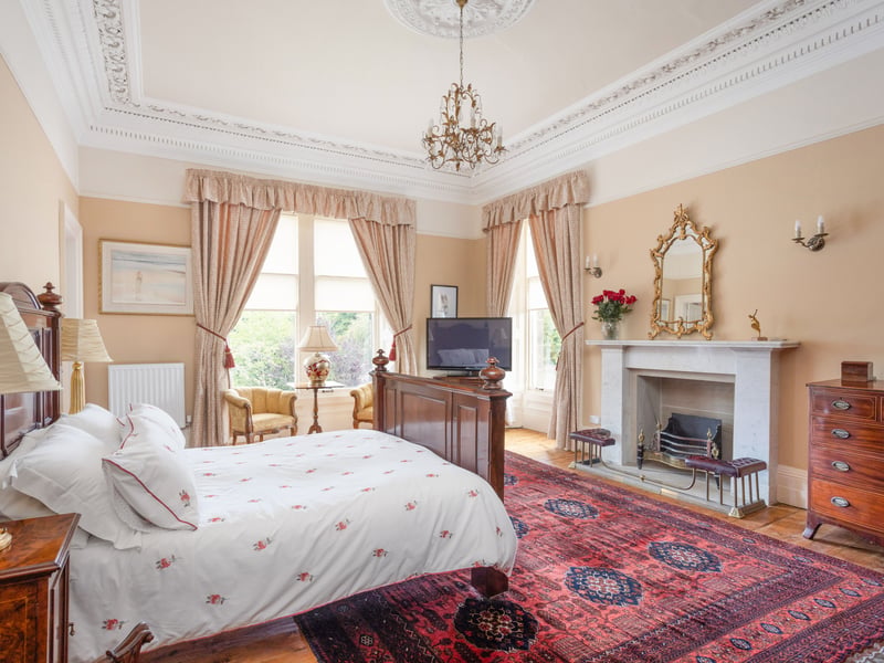 The principal bedroom is very spacious and is filled with natural light.