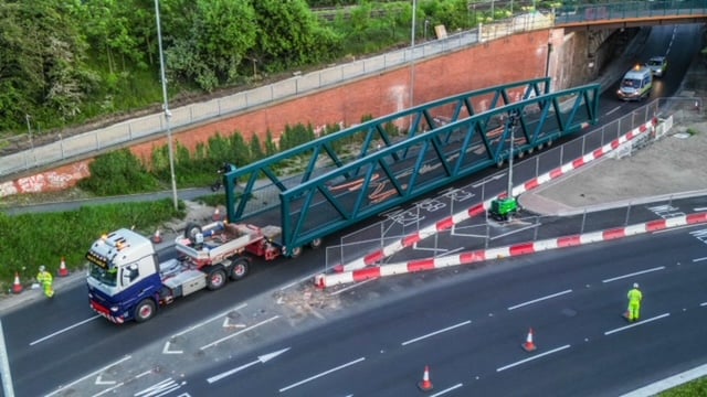 The main span of the Spence Lane footbridge was transported to the Armley Gyratory on Saturday night.