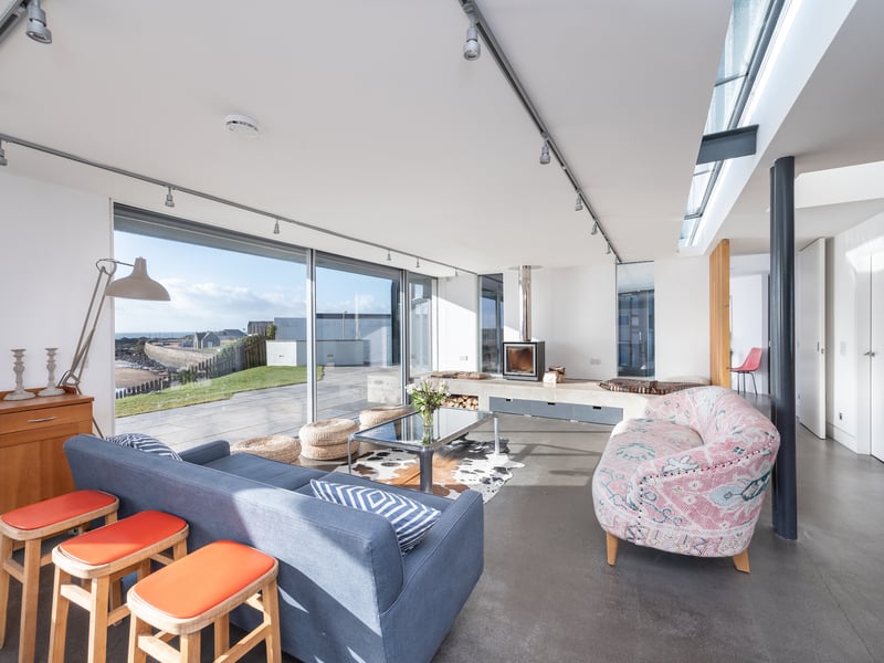 The owners bought a traditional bungalow on the site in 2011 and gave WT Architects a brief to design the perfect family holiday home that took full advantage of its setting.