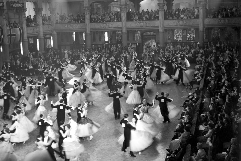 Dancers move around the floor in graceful style during a festival at the Empress Ballroom, Winter Gardens