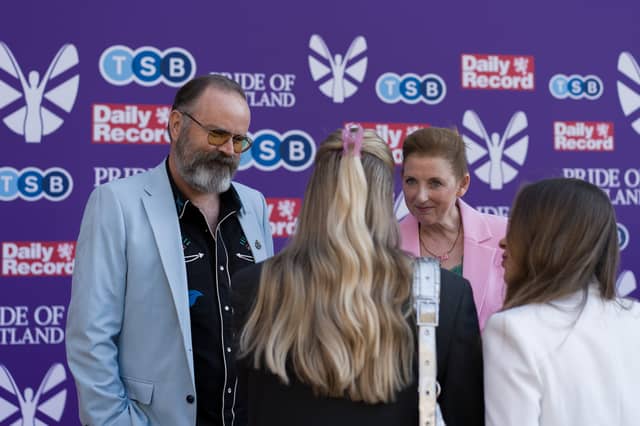 Still Game star Greg Hemphill was suited up for the event along with wife Julie Wilson Nimmo.