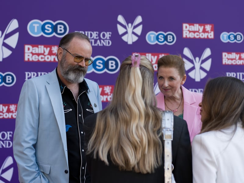 Still Game star Greg Hemphill was suited up for the event along with wife Julie Wilson Nimmo. 