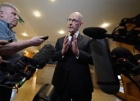 First Minister John Swinney speaking to the media in the Scottish Parliament at Holyrood, Edinburgh after Prime Minister Rishi Sunak called a General Election for July 4. 