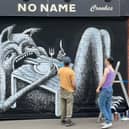 Phlegm putting the finishing touches on his brand new mural in Crookes, Sheffield.