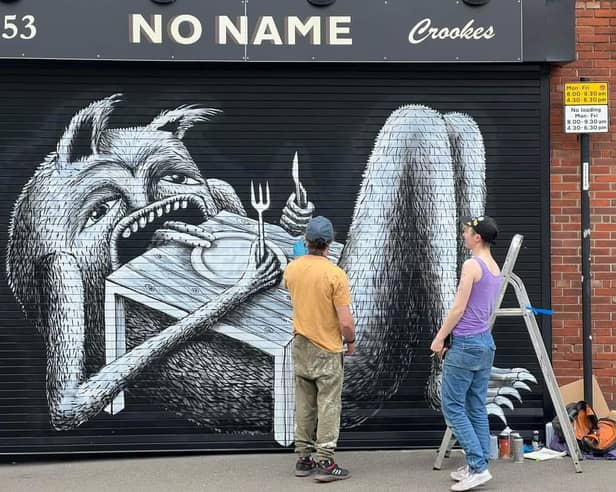 Phlegm putting the finishing touches on his brand new mural in Crookes, Sheffield.