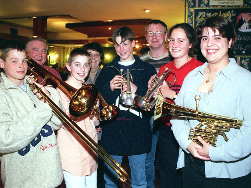 Poulton Brass Band were chosen by the Falcon Hotel in Poulton for the Gazette's Token Challenge. Pic shows some of the band warming up in the pub.