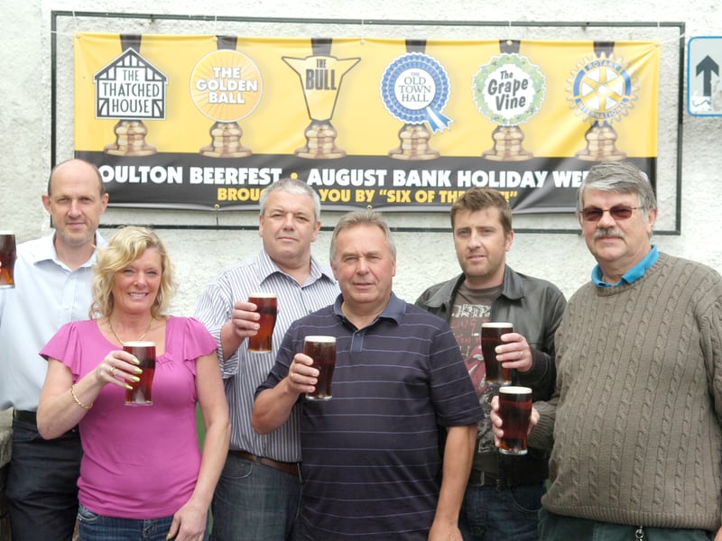 Pubs in Poulton have teamed up for a Real Ale Trail. L-R is Vin Hame from The Thatched House, Marie Ayrton from The Golden Ball, Neil Swift from The Bull, Des Smith from The Old Town Hall, Darren Woodcock from The Grapevine and Roger Critchley from Rotary