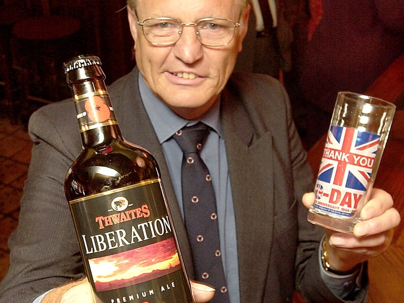 Organiser of Blackpool's D-Day events Jim Houldsworth at the River Wyre pub in Poulton with a bottle of ' Liberation Ale brewed for D-Day.