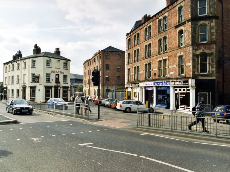 A view looking from Bridge End onto Meadow Lane in October 1999. The Old Red Lion public house can be seen on the left. 