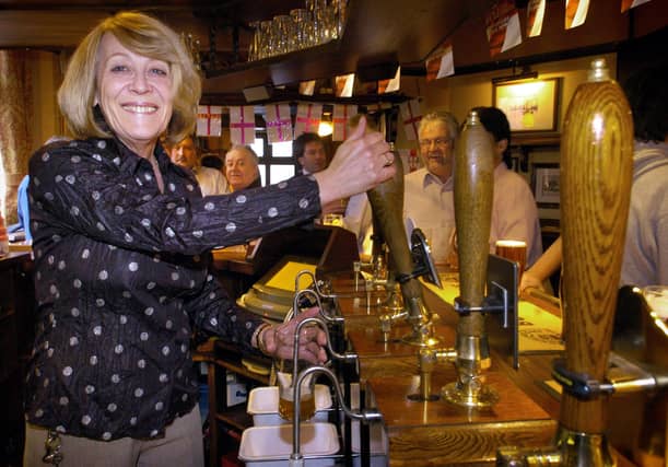 Val Ballantyne, pictured pulling her last pint after 16 years at The Thatched.