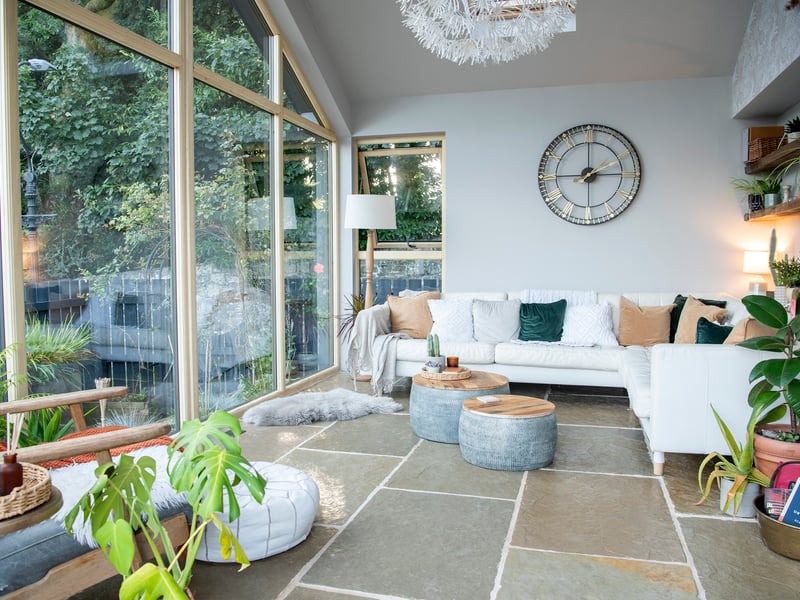 The bright sun room at Honeysuckle Cottage