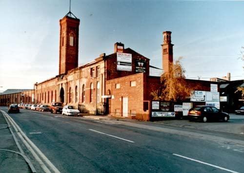 The Tower works pictured in November 1999. Built for Harding and son makers of pins, cards and combs for the textile industry. Shows the Itatiante Towers. The larger one is known as the Giotto Tower and is modelled on Giotto's campanile of 1334 at the Duomo in Florence. It was built 1899 functioning as an extract ventilation shaft. The smaller tower was built in 1864 and is modelled on a 12th century campanile of the Palazzo del Comune in Verona