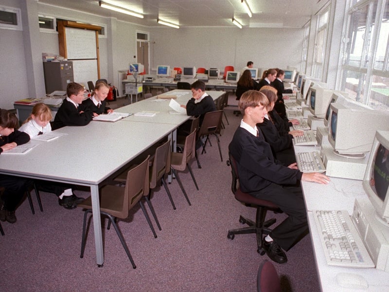 Pupils hard at work in the school's refurbished computer suite in September 1996.