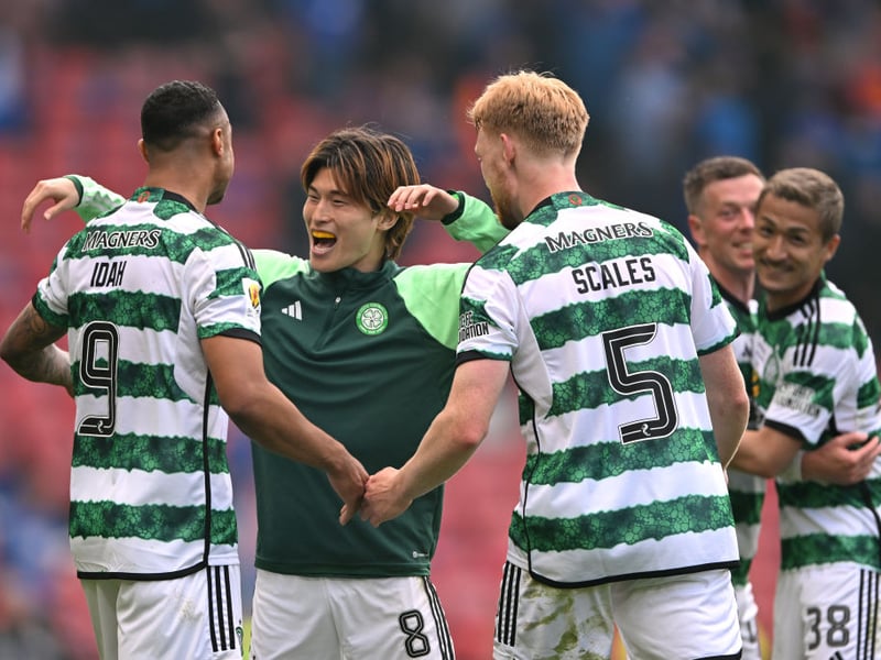 A hug for the match-winner from his fellow Celtic striker