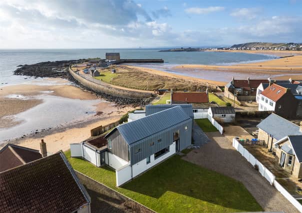Mid Rock House is in an enviable coastal position with far-reaching views over the bay and water.