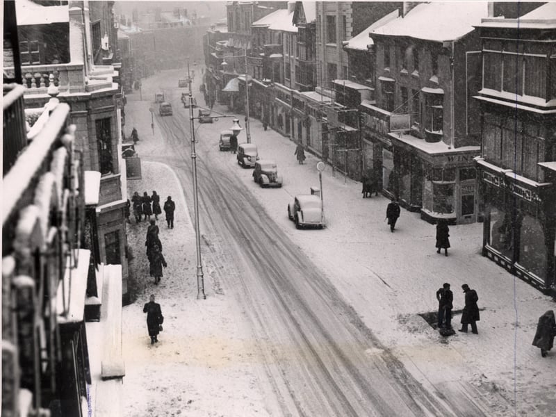 The white building to the left of this photo in a snowy Church Street is the Adelphi Hotel