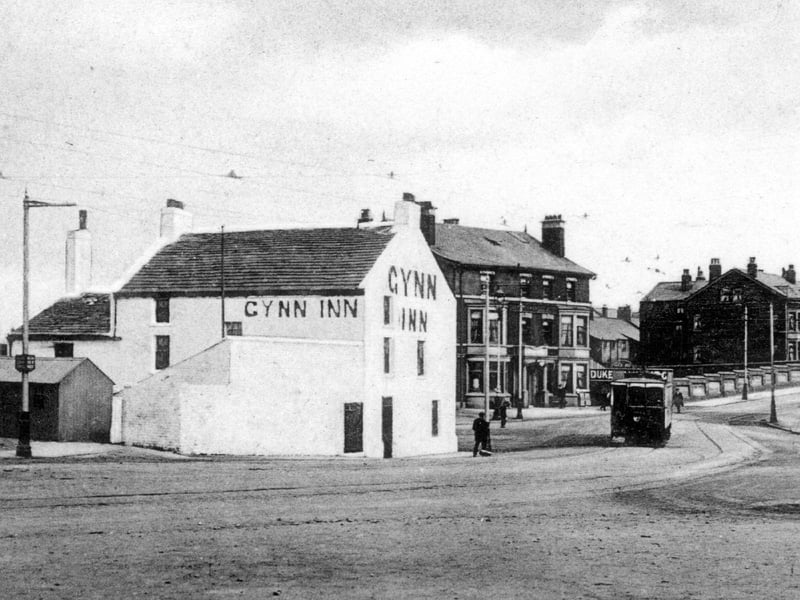 Originally a farm with a licence, the Gynn Inn, seen in this view from the early 1900s, looking towards Dickson Road, was demolished in 1921. The sale of fixtures and fittings of the old inn raised £30, with eight cast iron spittoons being sold for one shilling. The Duke of Cambridge Hotel to it's right was rebuilt as the present day Gynn, but the terrace of houses on the right still remains, some as homes others as businesses