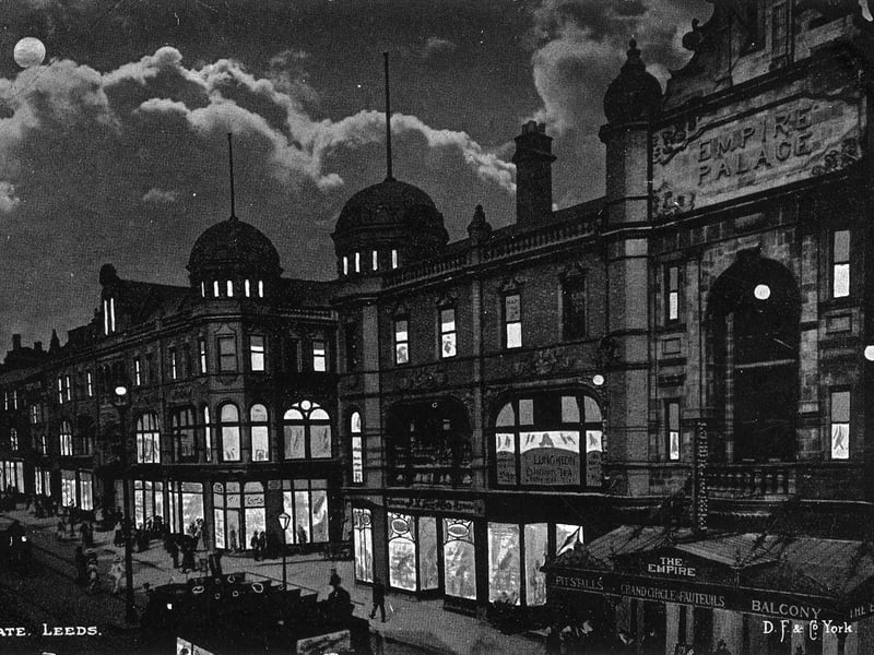 Briggate by night from a postcard with postmark November 7, 1903. The Empire Palace Theatre is on the right and the junction with Queen Victoria Street in the centre.