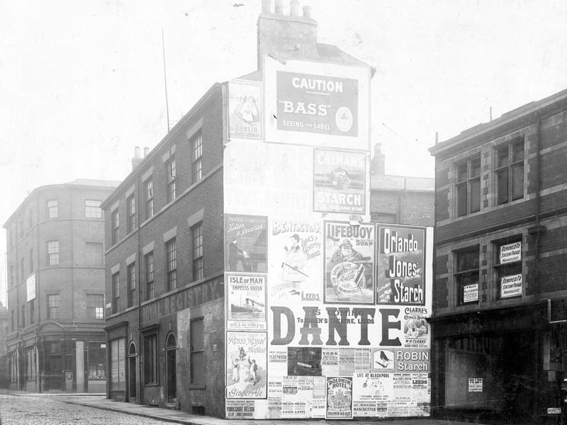 Woodhouse Lane in September 1903. Corner property on left, junction with Kelsall Street, Teale Fireplace co. and Albion Brewery Ltd, no.48. No.46 Robert Rauchke surgical instrument maker. No.44 Royal Registry, William Henry Pinder, emigration and shipping agent also servants registry office. 40/42 vacant with 'To Let' poster, second floor windows with change of adress notices. 'Walker and Normanton, architects' have moved to Station Parade, Harrogate. 