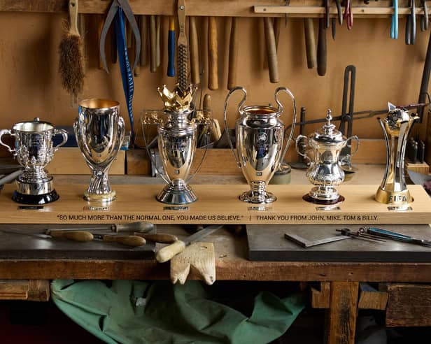 British Silverware was hired by the club’s owners to craft sterling silver cups to mark Jurgen Klopp's winning ways.
From left: League Cup, European Super-Cup, Premier League, Champions League, FA Cup and World Club Cup.
