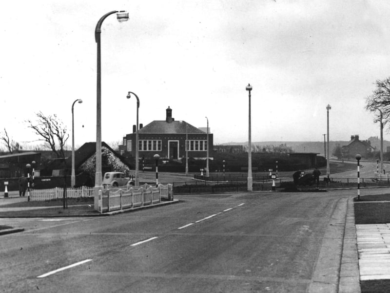 Bispham Village roundabout looking from Devonshire Road towards Blackpool with Bispham Library in the centre. Bispham Police Station was later built on the site of the cottage on the left. This was 1950