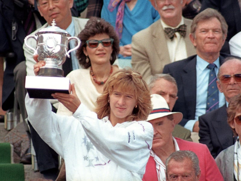 Ranked world number one for a record 377 weeks, Germany's Steffi Graf has earned a fortune estimated at $145 million. In 1988 she became the first player to complete the Golden Slam by winning all four major singles titles and the Olympic gold medal in the same year. She is the only player to have won each major singles tournament at least four times.