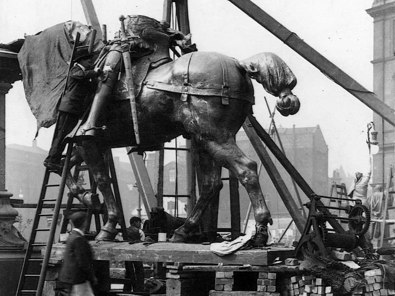 The statue of the Black Prince under construction in City Square. It was sculptured by Thomas Brock and unveiled on September 16, 1903. It had been paid for by Colonel Thomas Harding who owned Tower Works. Colonel Harding was a keen medieval historian and had the following inscription put on the statue ' Hero of Crecy and Poitiers. The flower of England chivalry. The upholder of the rights of the people in the Good Parliament'.