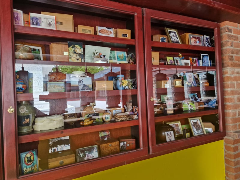 In the Prayer Wheel Walkway at Samye Ling is space for the ashes of beloved pets, accompanied by photographs and short descriptions of their lives. They are also referred to in prayers for the dead. 
